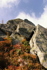 Rocks on mountain against sky