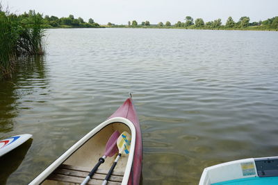 High angle view of boat floating on lake