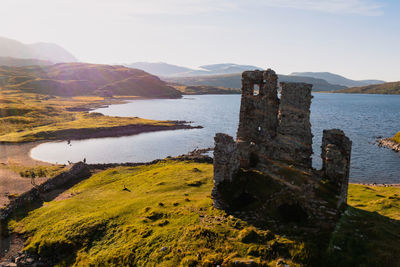 View of the ruined ardvreck castle over loch assynt, sutherland, north west highlands, scotland