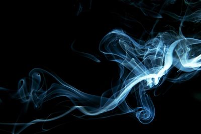 Close-up of smoke against black background