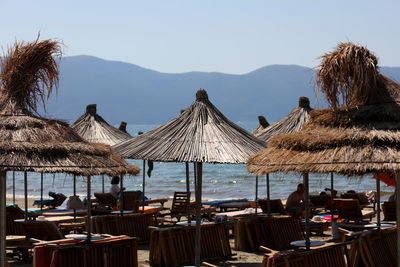 Scenic view of beach against clear sky