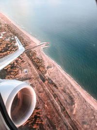 High angle view of sea seen through airplane window
