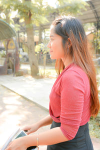 Side view of woman looking away