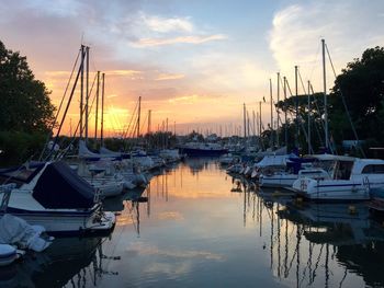 Boats moored at harbor