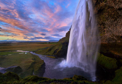 View of waterfall against sky