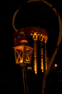 Close-up of illuminated lantern hanging at night