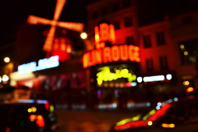 Defocused image of illuminated lights at night