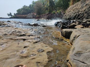 Scenic view of rocks in sea
