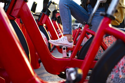 Low section of people on bicycle