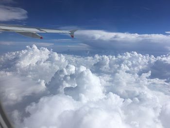 Low angle view of airplane flying in sky