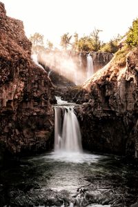 View of waterfall in forest