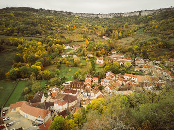 High angle view of townscape and trees in town