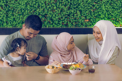 Lifestyle image of a happy family bonding together.