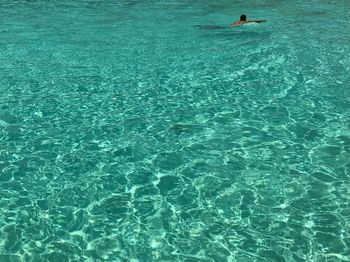 Person swimming in sea