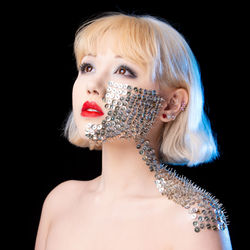 Bodyarmour portrait of a woman.  thumbtacks were glued to the model.  model  lian appelboom. 