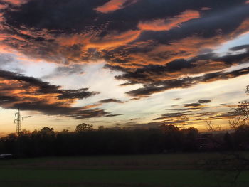 Scenic view of dramatic sky during sunset