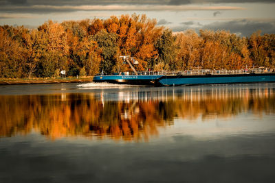 Scenic view of lake against sky during autumn