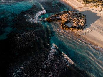 High angle view of rocks on beach