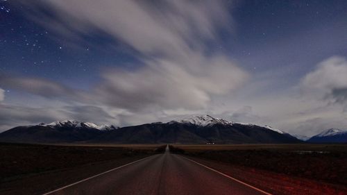 Road amidst landscape against sky