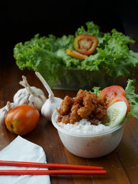 Close-up of fruits and vegetables on cutting board