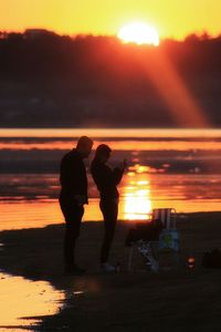 Scenic view of sea at sunset