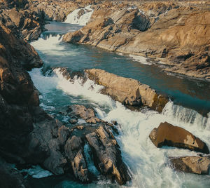 High angle view of rocks in sea