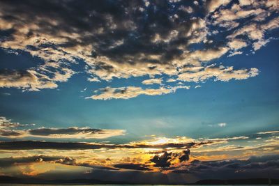 Low angle view of clouds in sky during sunset