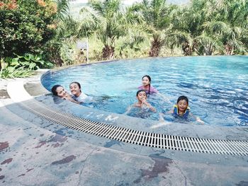 Group of people at swimming pool