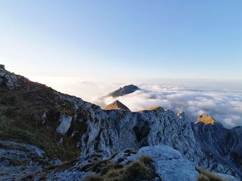 Scenic view of snowcapped mountains against sky