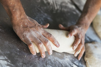 Close-up of man preparing food