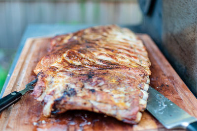 Close-up of meat on barbecue grill