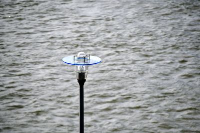 Close-up of lighting equipment on pole