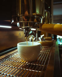 Close-up of coffee cup on table in cafe