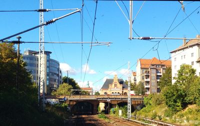 Railroad tracks against blue sky