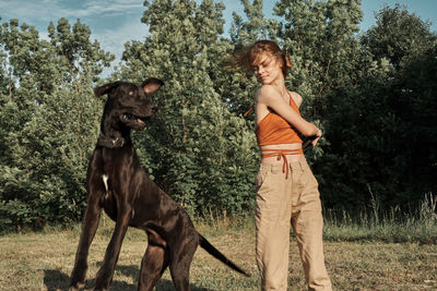 View of a dog standing on field