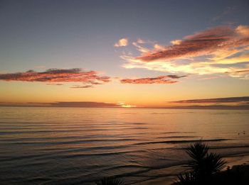 View of calm sea at sunset
