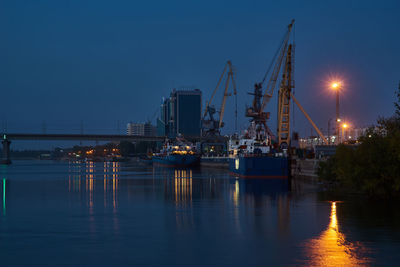 Evening dock view with ships and dockside cargo crane. astrakhan, russia