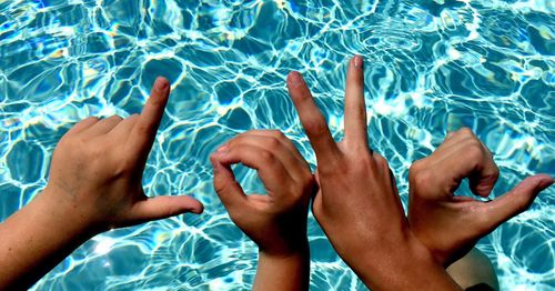 Low section of people in swimming pool