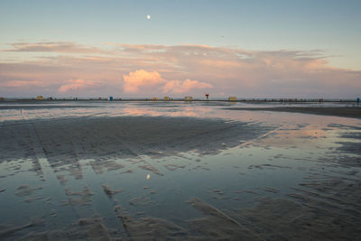 Scenic view of beach during sunset