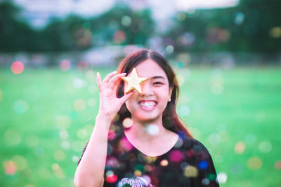 Portrait of smiling young woman