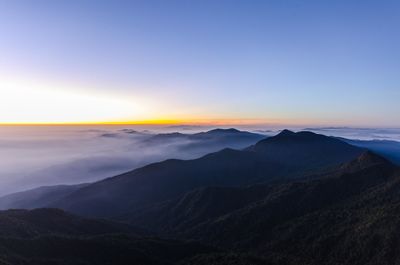 Scenic view of mountains against sky during sunset