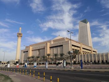 Buildings in city against sky