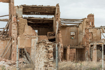 Abandoned built structure against sky