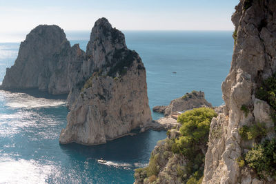 Famous island of capri in italy with its landscapes of cliffs and turquoise sea