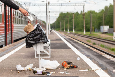 Man walking on railroad station platform