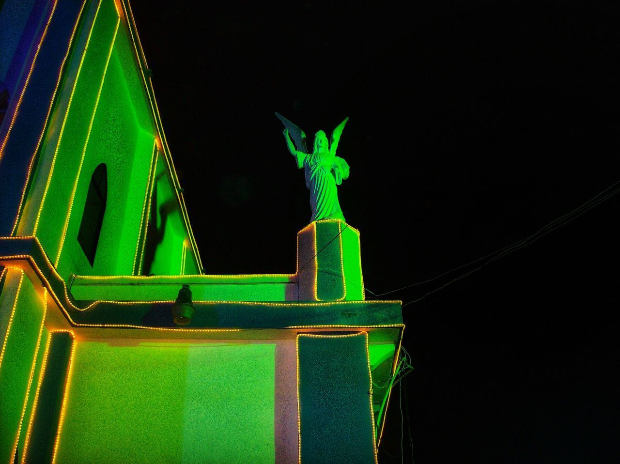 CLOSE-UP OF ILLUMINATED SCULPTURE