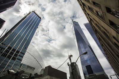 Low angle view of skyscrapers against sky