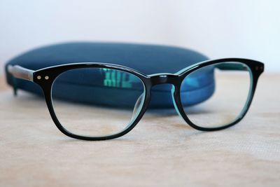 Close-up of eyeglasses on table