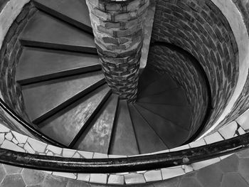 Directly below shot of spiral staircase of building