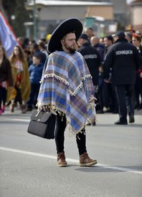 Man walking on street in city